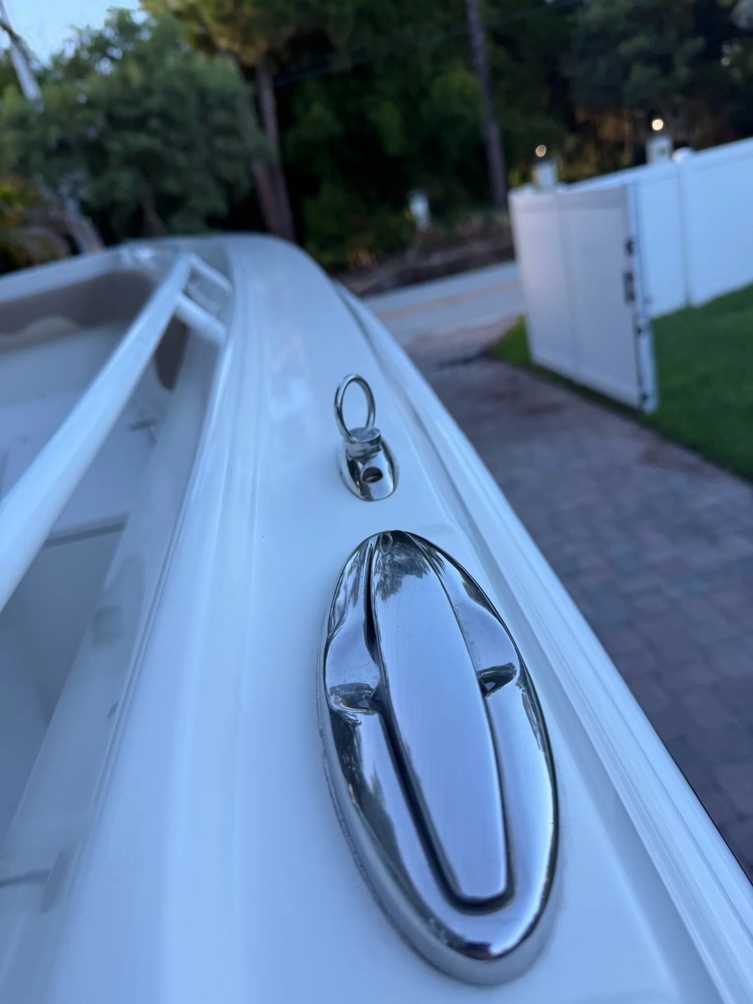 Close-up of polished stainless cleat and gelcoat by First Due Marine Co.