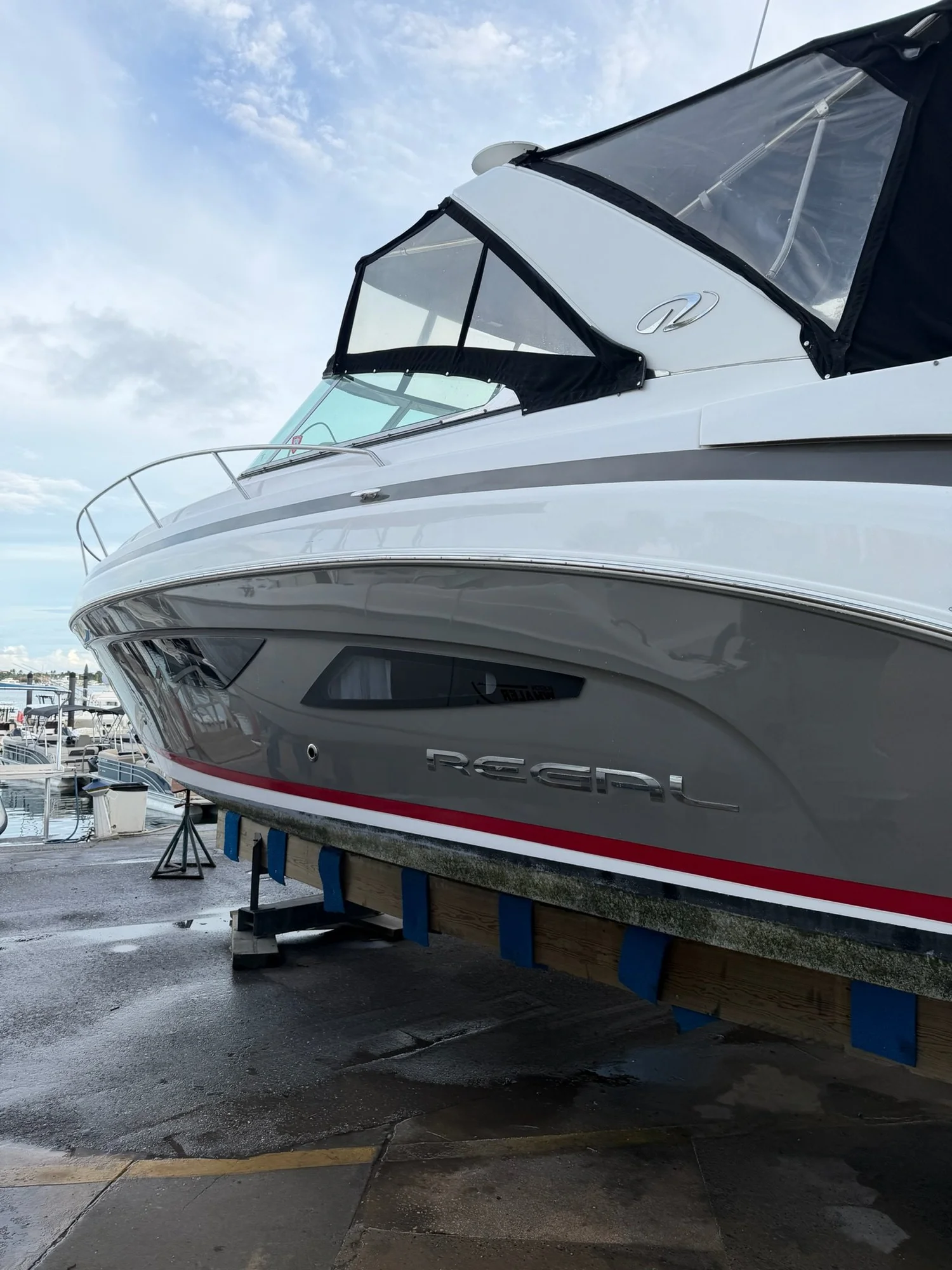 Close-up of a polished Regal hull by First Due Marine Co.